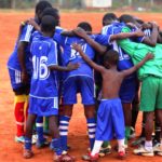 Football team in a huddle